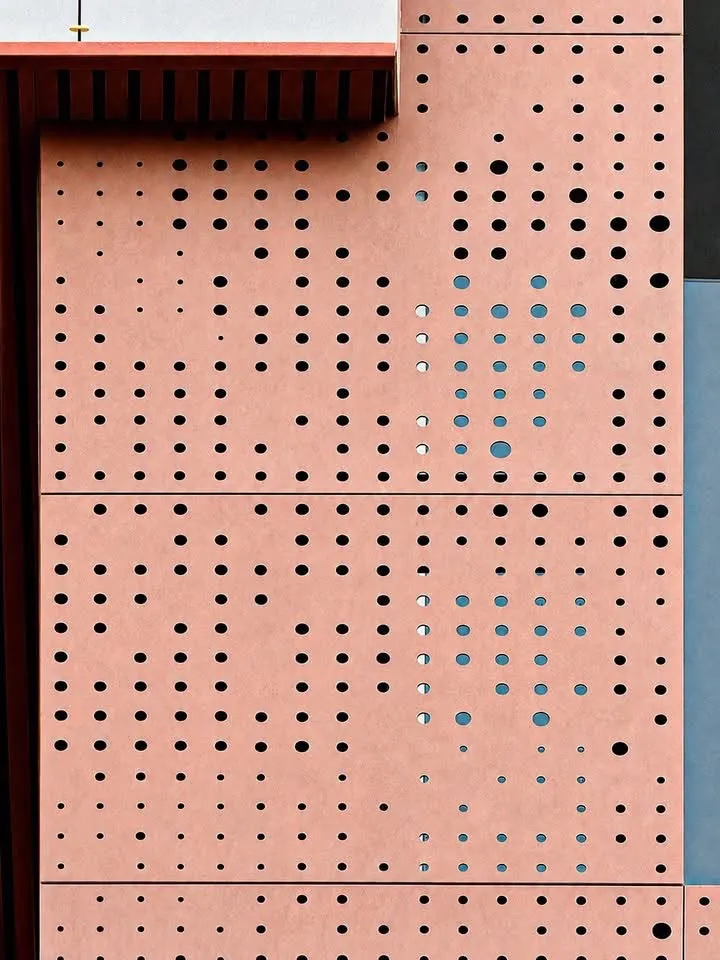 Terracotta perforated facade cladding