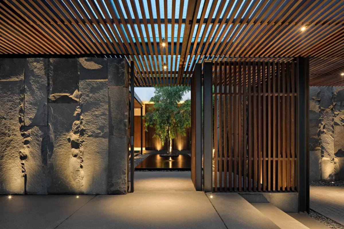 Suspended aluminium ceiling with wooden rafter accents