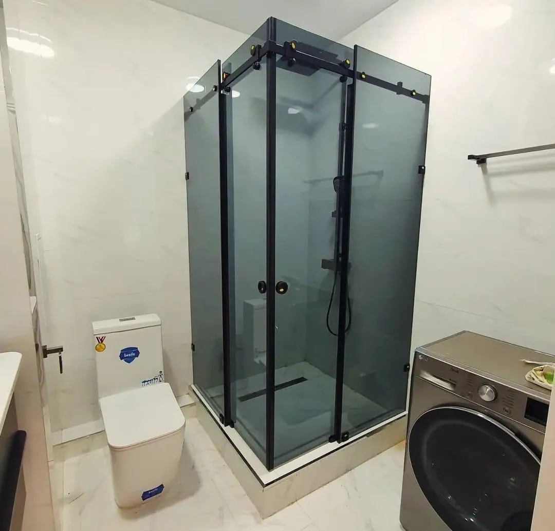 Small bathroom sliding glass shower partition